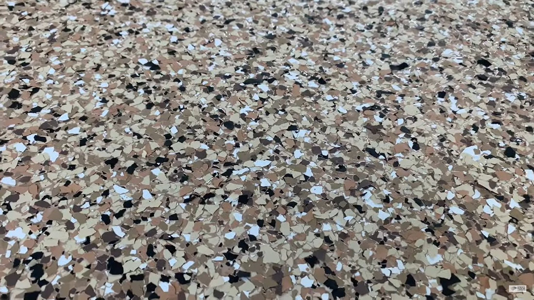 Epoxy concrete floor coating with decorative flakes